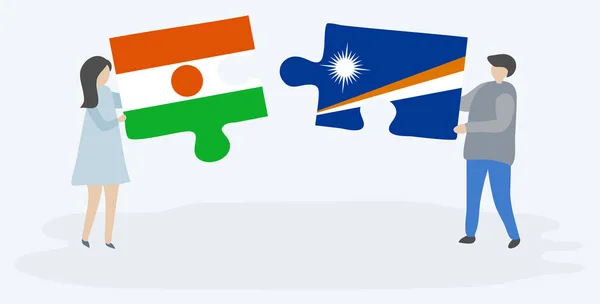 Para Trzyma Dwa Kawałki Puzzli Nigerien Marshallese Flagi Symbole Narodowe — Wektor stockowy