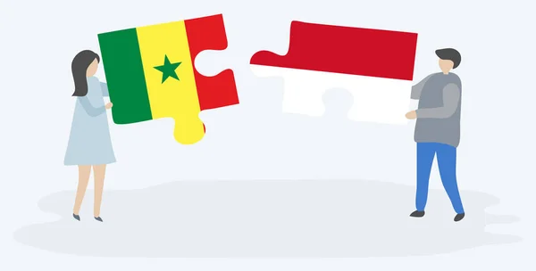 Casal Segurando Duas Peças Quebra Cabeças Com Bandeiras Senegalesas Monegascos — Vetor de Stock