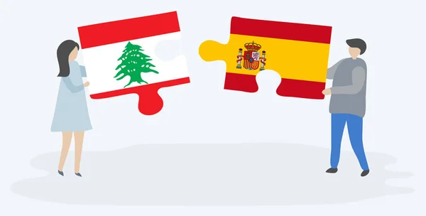 Para Trzyma Dwa Puzzle Kawałki Libańskich Hiszpańskich Flag Symbole Narodowe — Wektor stockowy