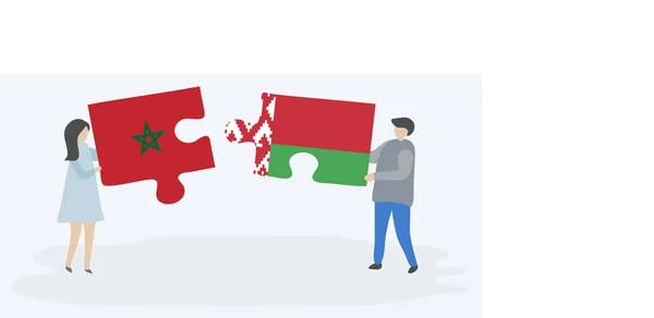 Пара Держащая Две Головоломки Марокканскими Белорусскими Флагами Государственные Символы Марокко — стоковый вектор