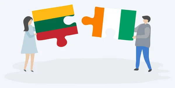 Paar Houden Twee Puzzels Stukken Met Litouwse Ivoriaanse Vlaggen Litouwen — Stockvector