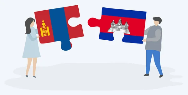 Pár Jich Drží Dvě Skládanky Mongolskými Kambodžskými Vlajkami Mongolsko Kambodžské — Stockový vektor