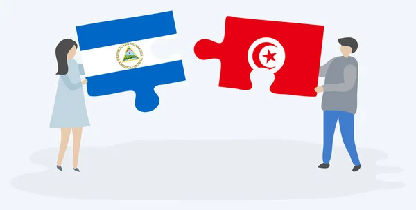 Casal Segurando Duas Peças Quebra Cabeças Com Bandeiras Nicarágua Tunísia —  Vetores de Stock