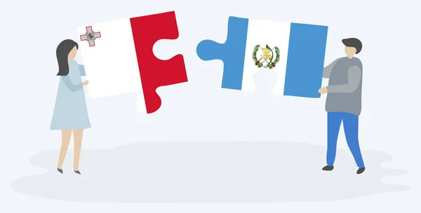 マルタとグアテマラの旗を持つ2つのパズルピースを保持しているカップル マルタとグアテマラの国のシンボル — ストックベクタ