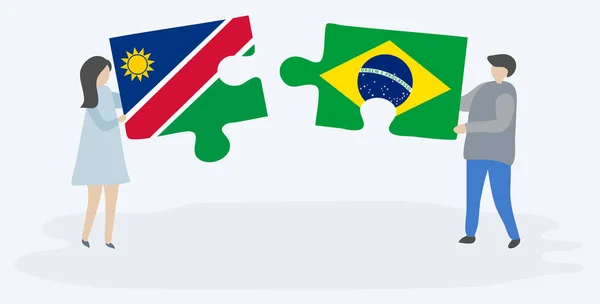 Dvojice Drží Dvě Skládanky Namibijský Brazilskými Vlajkami Namibie Brazilské Národní — Stockový vektor