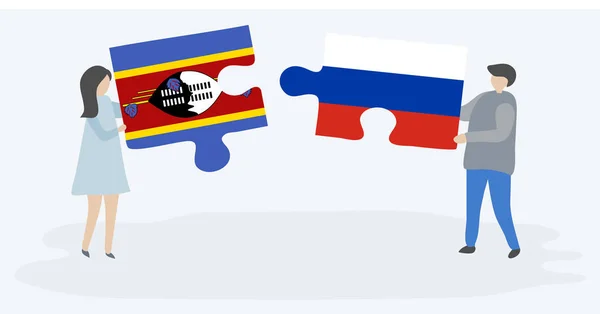 Para Trzyma Dwa Kawałki Puzzli Suazi Rosyjskich Flag Suazi Rosja — Wektor stockowy