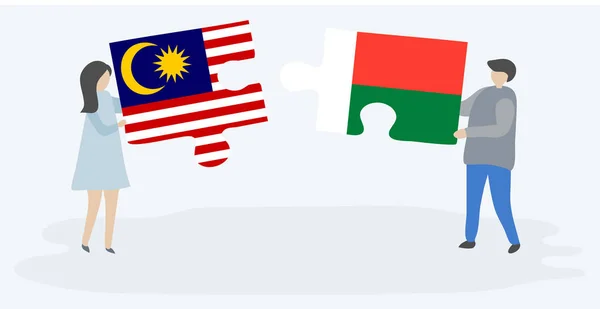Paar Houden Twee Puzzels Stukken Met Maleisische Malagasi Vlaggen Maleisië — Stockvector