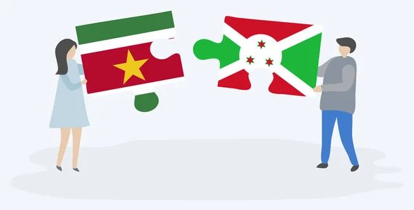 Pareja Sosteniendo Dos Piezas Rompecabezas Con Banderas Suriname Burundi Surinam — Vector de stock