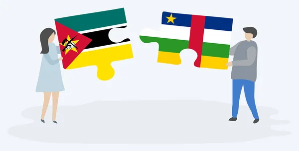 Paar Houden Twee Puzzels Stukken Met Mozambican Centraal Afrikaanse Vlaggen — Stockvector