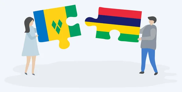Пара Держащая Две Головоломки Винчентианскими Маврикийскими Флагами Национальные Сборные Сент — стоковый вектор