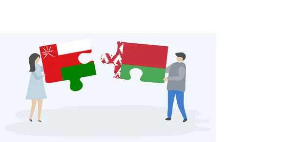Couple Tenant Deux Pièces Puzzles Avec Des Drapeaux Omanais Biélorusses — Image vectorielle