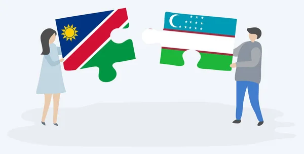 Pareja Sosteniendo Dos Piezas Rompecabezas Con Banderas Namibia Uzbekistán Namibia — Vector de stock