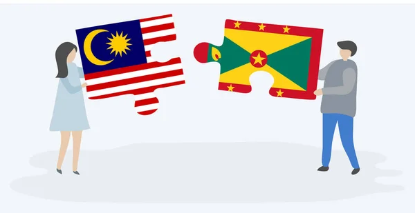 Pár Jich Drží Dvě Skládanky Malajsijskými Graniónskými Vlajkami Národní Symboly — Stockový vektor