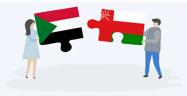 Dvojice Drží Dvě Skládanky Vlajkami Súdánů Omani Súdánskou Ománskou Národní — Stockový vektor