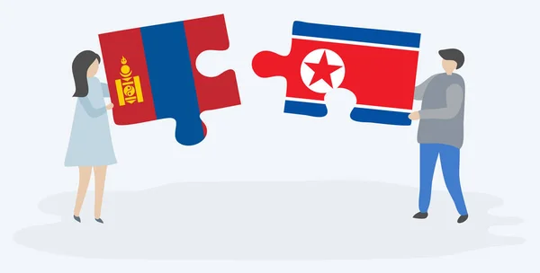Pár Jich Drží Dvě Skládanky Vlajkou Mongolských Severokorejských Mongolsko Severní — Stockový vektor