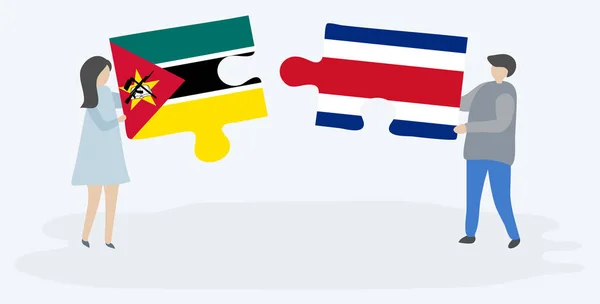 Paar Houden Twee Puzzels Stukken Met Mozambican Costa Ricaanse Vlaggen — Stockvector