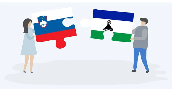 Couple Holding Two Puzzles Pieces Slovenian Basotho Flags Slovenia Lesotho — Stock Vector