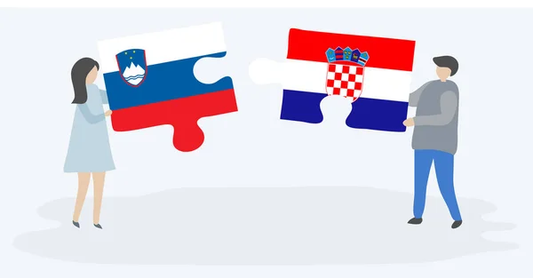 Paar Mit Zwei Puzzleteilen Mit Slowenischen Und Kroatischen Fahnen Slowenien — Stockvektor