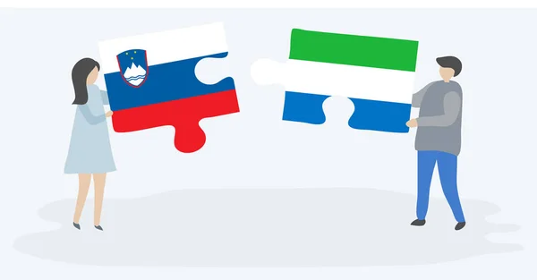 Paar Houden Twee Puzzels Stukken Met Sloveense Sierra Leonean Vlaggen — Stockvector