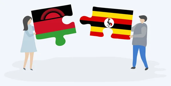 Para Trzyma Dwa Kawałki Puzzli Malawią Ugandy Flagi Malawi Uganda — Wektor stockowy