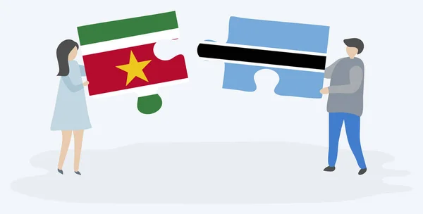 Dvojice Drží Dvě Skládanky Surinamózou Motswanovou Vlajkou Národní Symboly Surinamu — Stockový vektor
