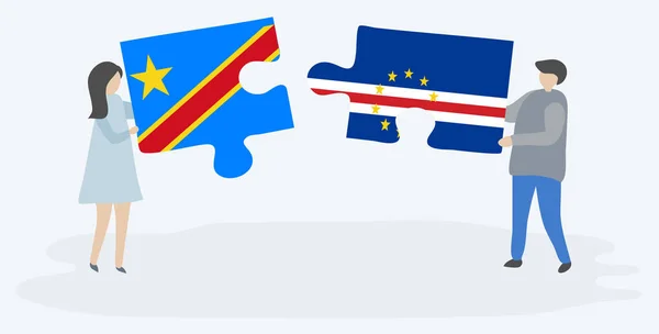 一对夫妇拿着两块拼图 上面挂着刚果和佛得角国旗 刚果民主共和国和佛得角国家象征在一起 — 图库矢量图片