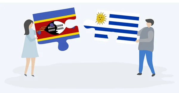 Casal Segurando Duas Peças Quebra Cabeças Com Bandeiras Suazis Uruguaias —  Vetores de Stock