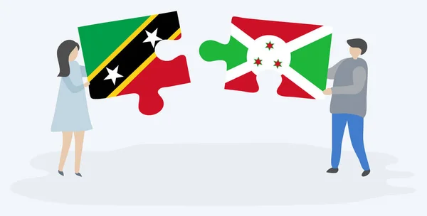Casal Segurando Duas Peças Quebra Cabeças Com Bandeiras Kittitian Burundian — Vetor de Stock