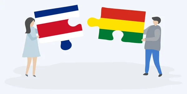 Couple Tenant Deux Pièces Puzzles Avec Des Drapeaux Costaricains Boliviens — Image vectorielle