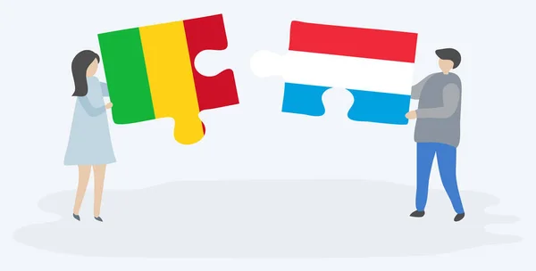 Pareja Sosteniendo Dos Piezas Rompecabezas Con Banderas Malienses Luxemburguesas Malí — Archivo Imágenes Vectoriales