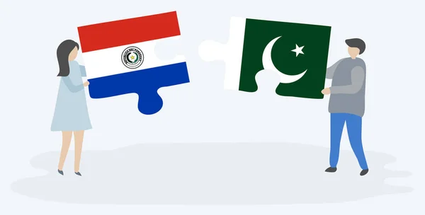 Paraguay Pakistan Bayrakları Ile Iki Bulmaca Parçaları Tutan Çift Paraguay — Stok Vektör