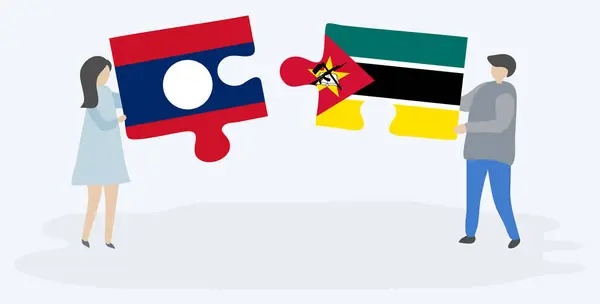 Couple Tenant Deux Pièces Puzzles Avec Des Drapeaux Lao Mozambicain — Image vectorielle