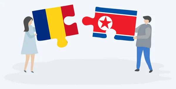 Pareja Sosteniendo Dos Piezas Rompecabezas Con Banderas Rumanas Norcoreanas Rumanía — Vector de stock