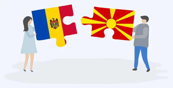 Couple Tenant Deux Pièces Puzzles Avec Des Drapeaux Moldaves Macédoniens — Image vectorielle
