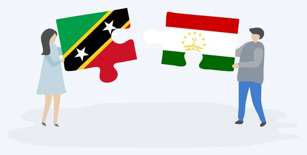 一对夫妇拿着两个拼图片与基蒂蒂安和塔吉克斯坦国旗 圣基茨和尼维斯和塔吉克斯坦国家符号在一起 — 图库矢量图片