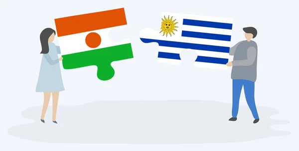 Couple Holding Two Puzzles Pieces Nigerien Uruguayan Flags Niger Uruguay — Stock Vector