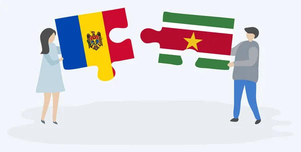 Moldova Surinam Bayraklarıyla Iki Bulmaca Tutan Çift Moldova Surinam Ulusal — Stok Vektör