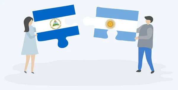 Пара Проведення Двох Головоломок Штук Nicaraguan Аргентинських Прапорів Нікарагуа Аргентина — стоковий вектор