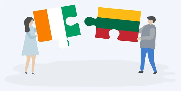 Çift Fildişi Litvanya Bayrakları Ile Iki Bulmaca Parçaları Tutan Fildişi — Stok Vektör