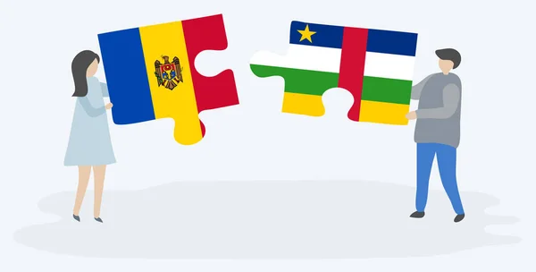 モルドバと中央アフリカの旗と2つのパズルのピースを保持しているカップル モルドバと中央アフリカ共和国のシンボル — ストックベクタ