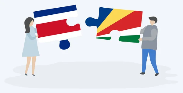 Couple Tenant Deux Pièces Puzzles Avec Des Drapeaux Costaricains Seychellois — Image vectorielle