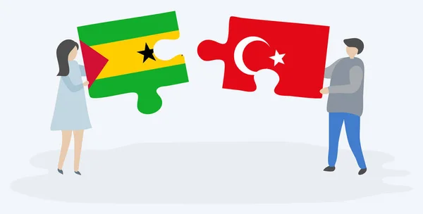 Sao Tomean Türk Bayrakları Ile Iki Bulmaca Parçaları Tutan Çift — Stok Vektör