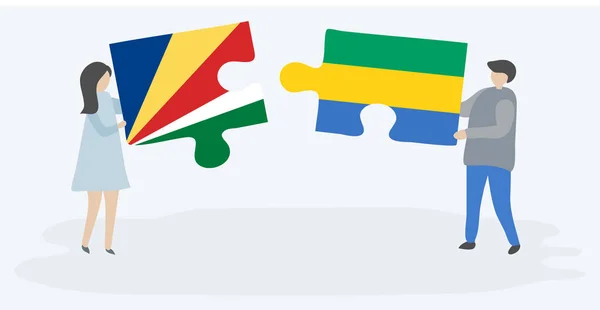Seychellois Gabonese Bayrakları Ile Iki Bulmaca Parçaları Tutan Çift Seyşeller — Stok Vektör