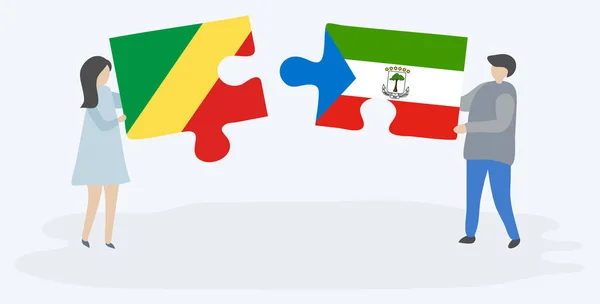 Couple Tenant Deux Pièces Puzzles Avec Des Drapeaux Congolais Guinéens — Image vectorielle