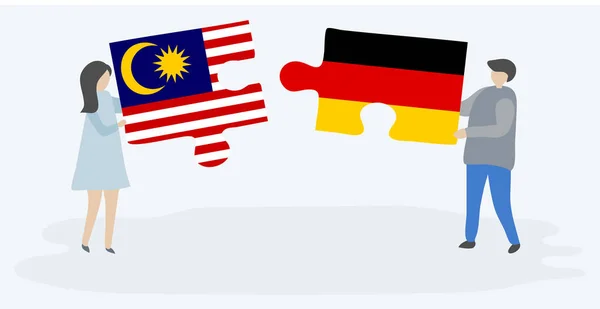 Paar Mit Zwei Puzzleteilen Mit Malaysischen Und Deutschen Flaggen Malaysia — Stockvektor