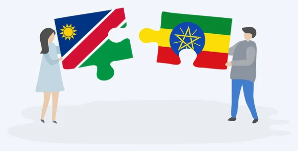 Pareja Sosteniendo Dos Piezas Rompecabezas Con Banderas Namibia Etiopía Namibia — Vector de stock