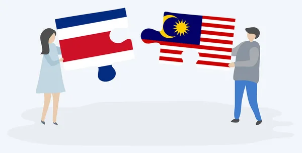 Paar Houden Twee Puzzels Stukken Met Costa Ricaanse Maleisische Vlaggen — Stockvector
