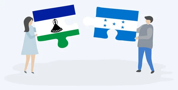 Couple Holding Two Puzzles Pieces Basotho Honduran Flags Lesotho Honduras — Stock Vector