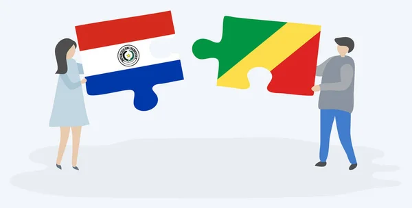 Paar Houden Twee Puzzels Stukken Met Paraguayaanse Congolese Vlaggen Paraguay — Stockvector