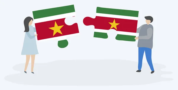 Pareja Sosteniendo Dos Piezas Rompecabezas Con Banderas Surinamesas Surinamesas Surinam — Vector de stock